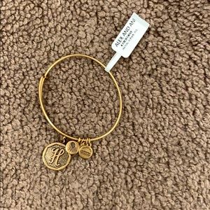 Gold H Alex and Ani bracelet